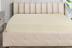 Elastyczne, kolorowe prześcieradło Klinmam Home Jersey, kolor kremowy, 100x200 cm