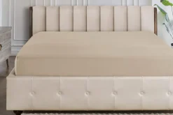 Elastyczne, kolorowe prześcieradło Klinmam Home Jersey, kolor warm sand, 100x200 cm